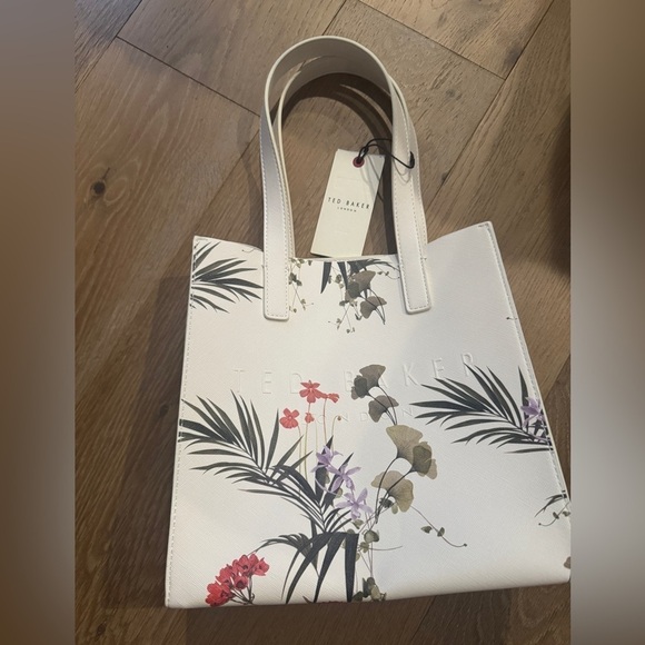 Ted Baker London Handbags - NWT Ted baker the icon purse in white floral pattern